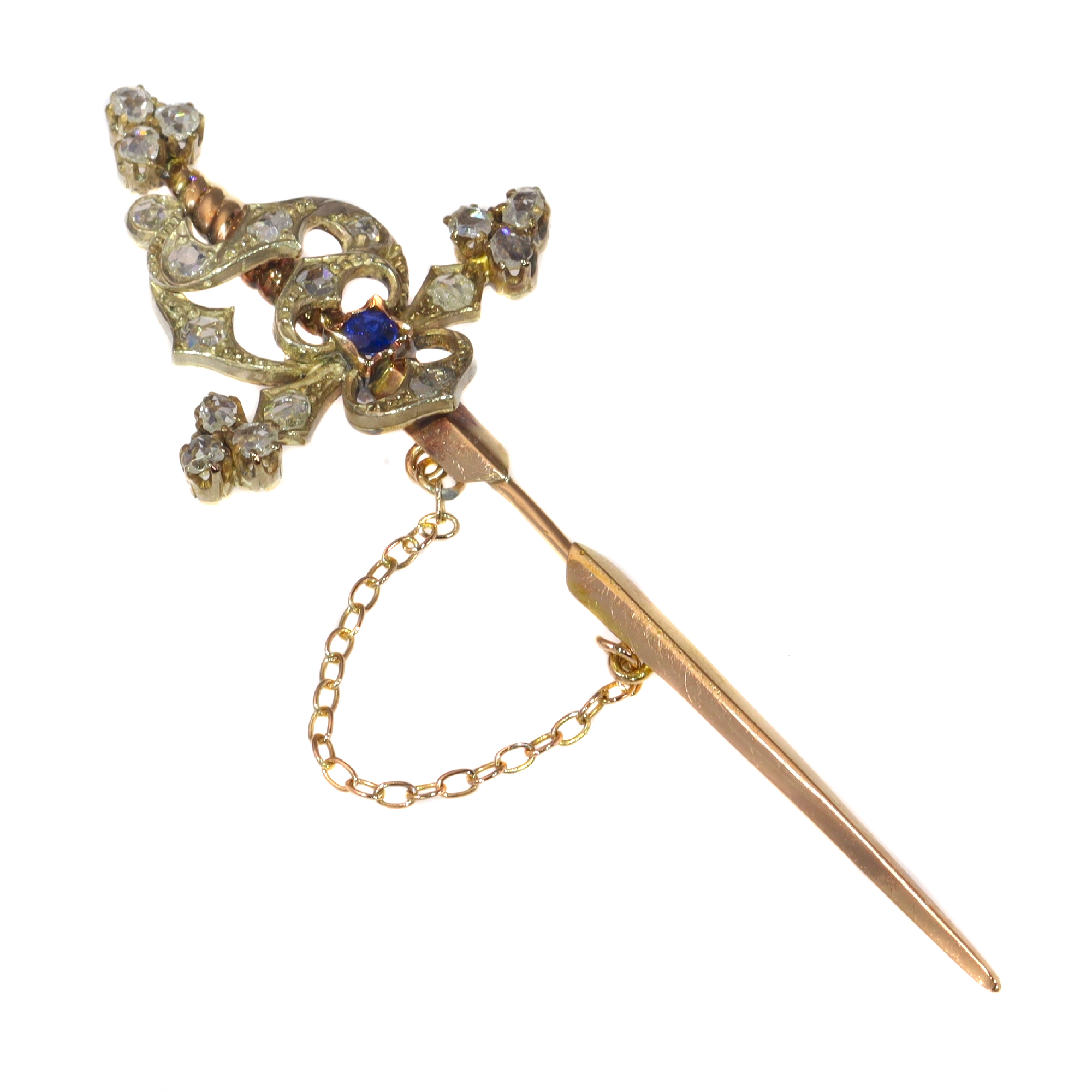 Vintage pin in the form of a sword set with diamonds and a sapphire